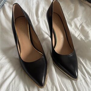 BCBGeneration Black Leather Pointed Toe Pumps with Gold Trim